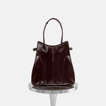 KIMIAS burgundy leather carryall tote on a white background